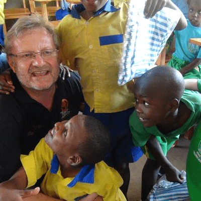 Charlie Trace with funded children